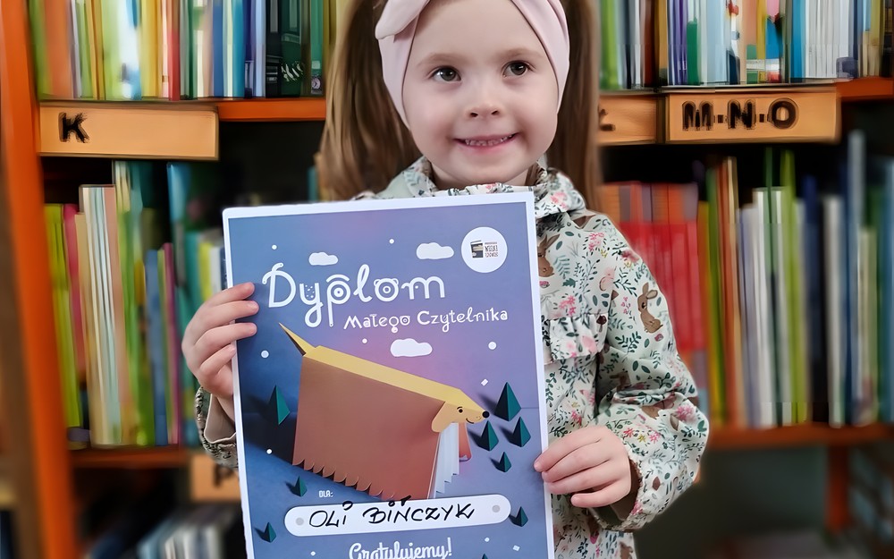 Zdjęcie Oli z dyplomem