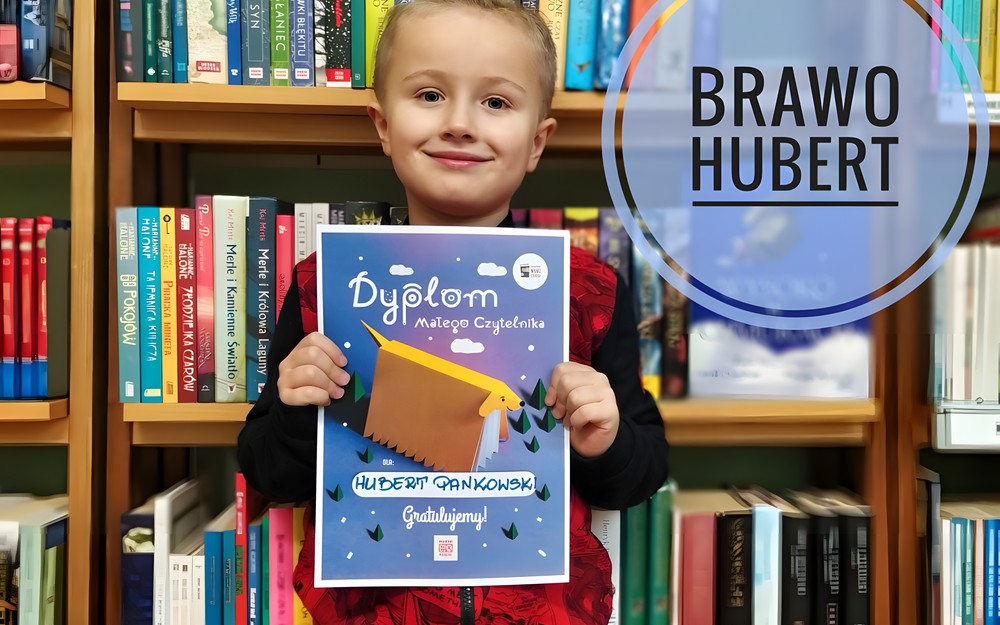 Zdjęcie Huberta z dyplomem
