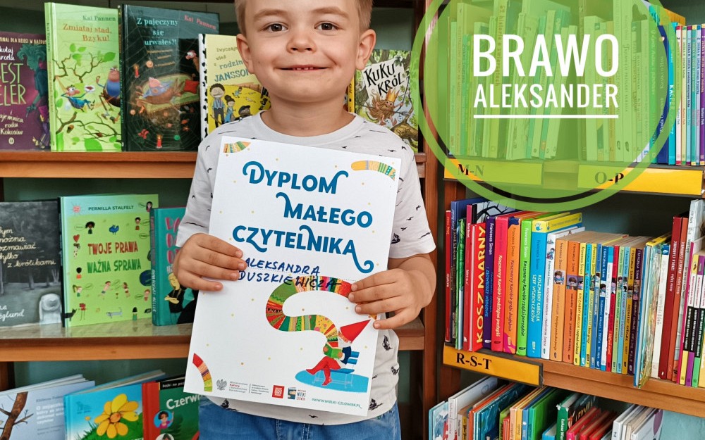 Zdjęcie Aleksandra z dyplomem