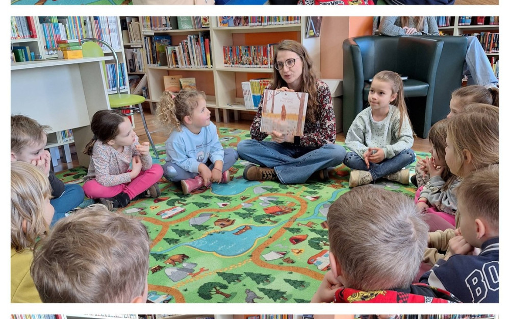 Czytanie na dywanie przedszkolakom.