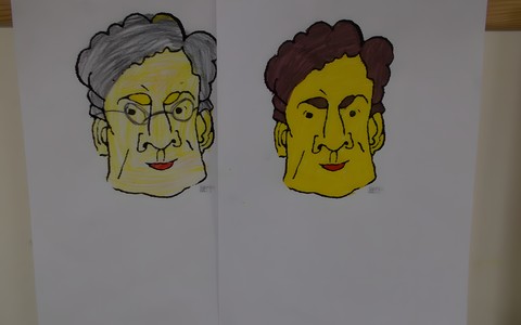 Rysunek dwóch twarzy, które różnia się kolorem włosów, twarzy.