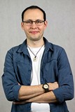 Zdjęcie portretowe Piotra Kowalczyka