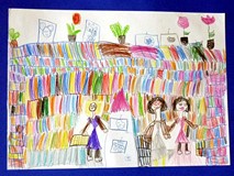 Na rysunku dzieci namalowały naszą bibliotekę i nas - bibliotekarki